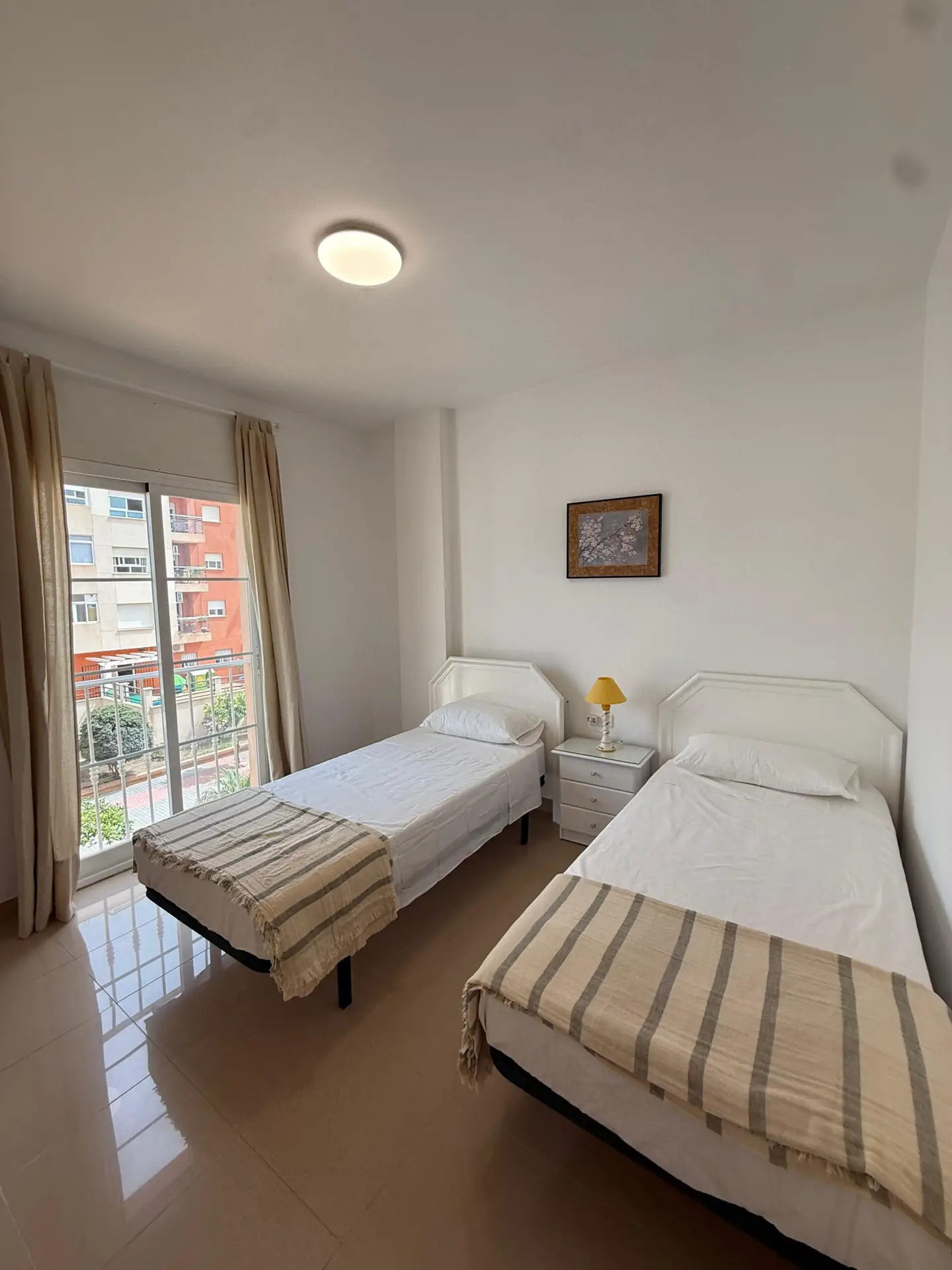 Second bedroom with two single beds